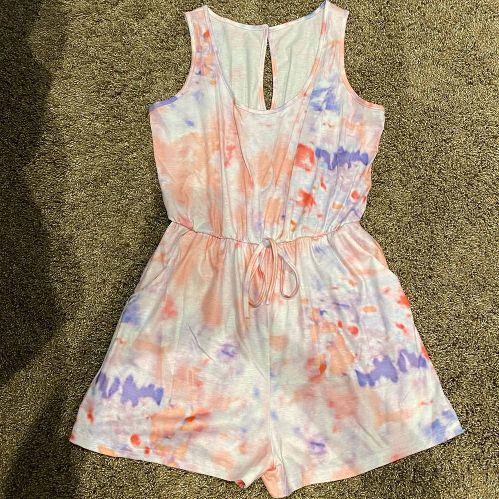 To dye romper from boutique no brand or tags. It fits like a size small/medium